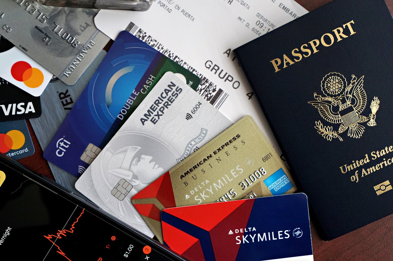 Smartphone Cash Credit Cards and Passport and Ticket